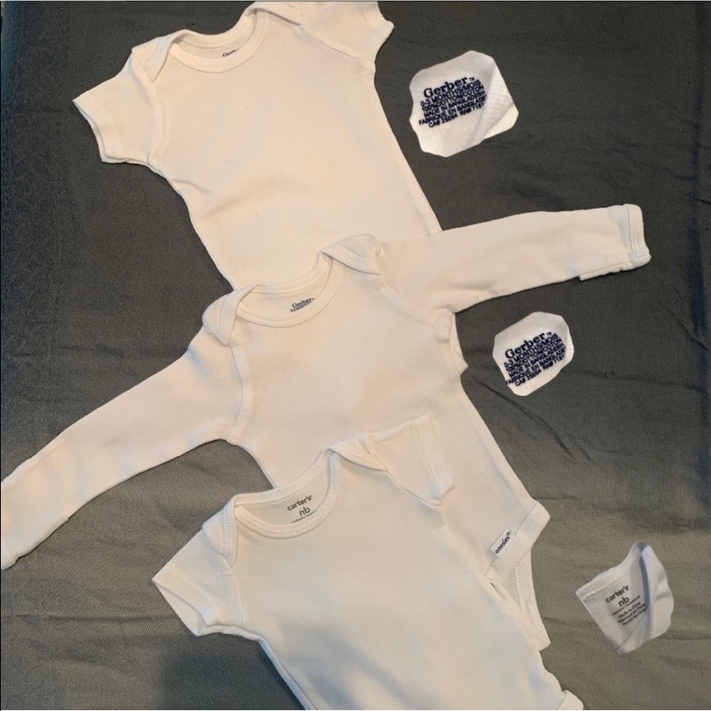 Newborn white gerber baby onesie.